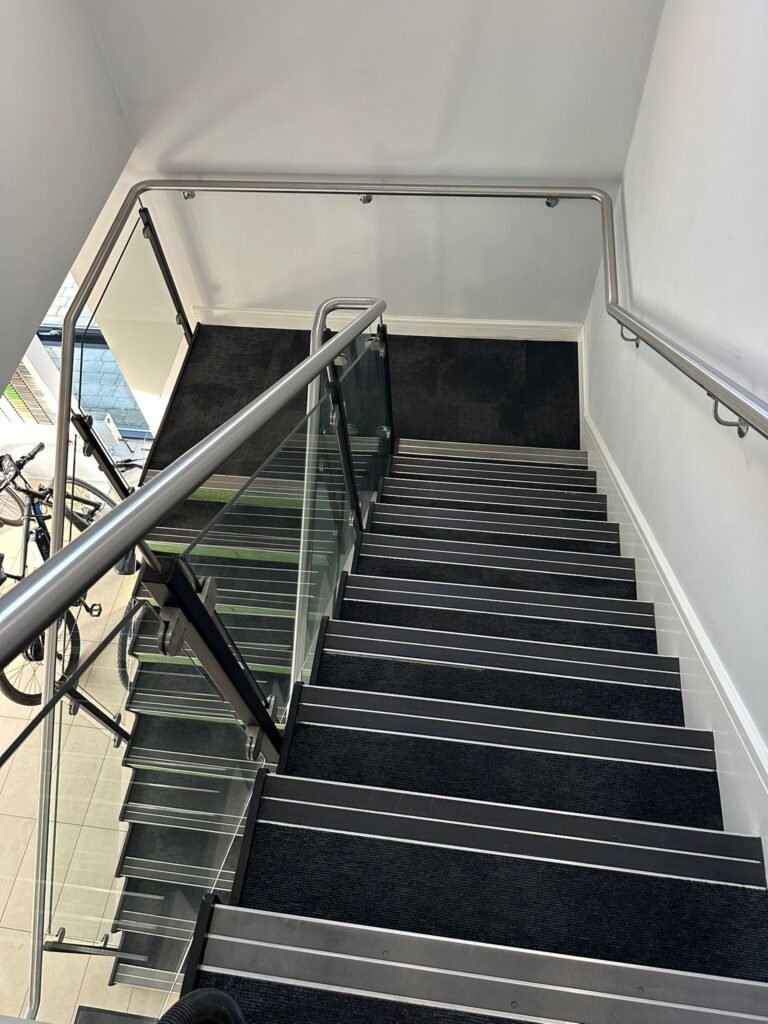 Commercial staircase carpet cleaning in a Dublin business premises